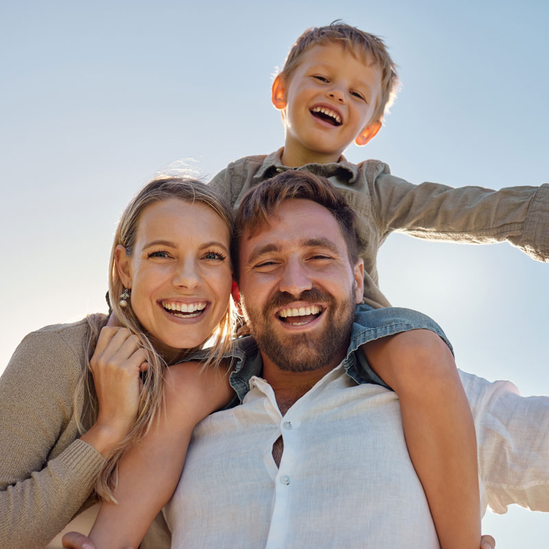 a family walking on beach